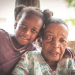 Garifuna elder and child in Dangriga, Belize, photograph by Garinagu Melivn